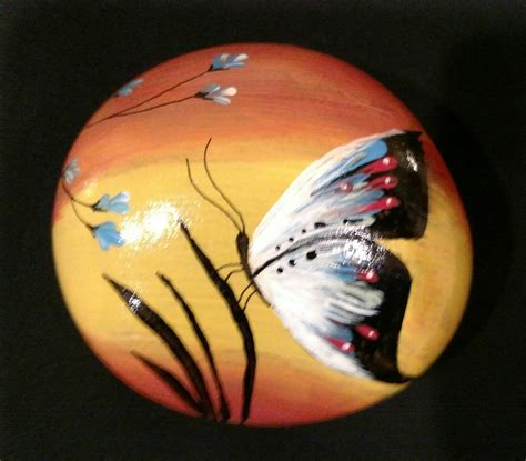 Butterfly painted rock. | Painted rock animals, Stone art, Painted rocks