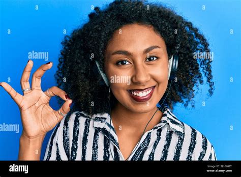 Beautiful African American Woman With Afro Hair Wearing Call Center