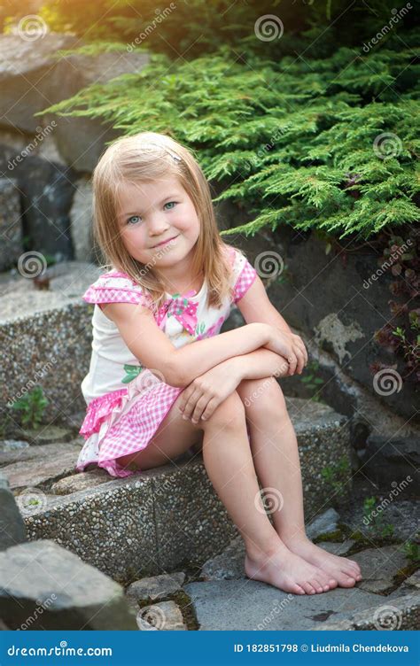 Little Girl Wearing Dress Barefoot