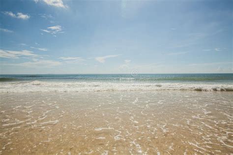 Sunny Seaside Scenery Fine White Sand Blue Sky And White Clouds Stock