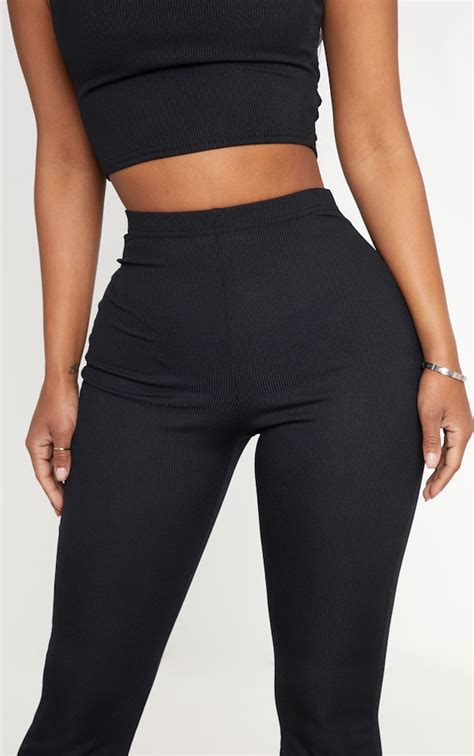 Shape Black Ribbed Flared Trousers Shape Prettylittlething