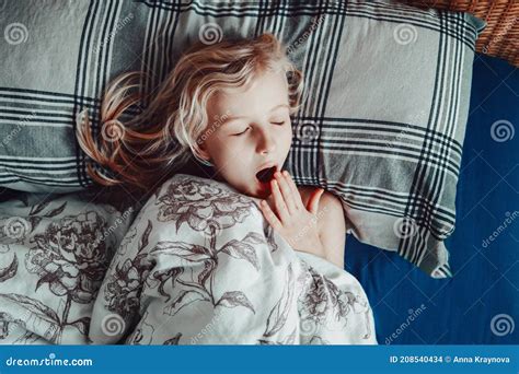 Cute Adorable Little Child Girl Sleeping Yawning In Bed At Home Sweet