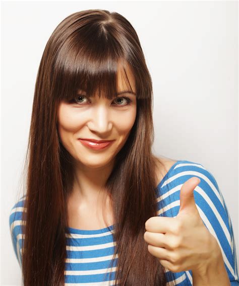 Premium Photo Happy Smiling Beautiful Young Woman Showing Thumbs Up