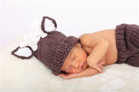 Cute Baby Boy In Deer Cap Sleeping On Fur Stock Image Image Of