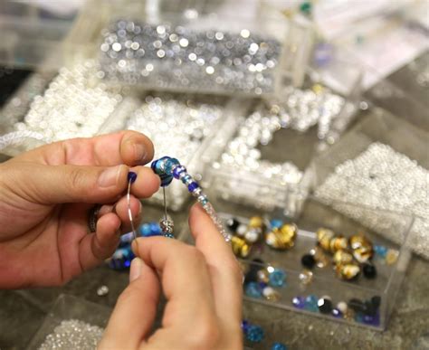 Premium Photo Close Up Of Person Hands Making Decoration