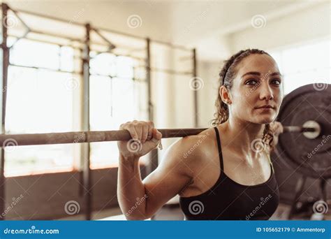 Young Female Doing Squats At Gym Stock Image Image Of Exercising Fitness 105652179