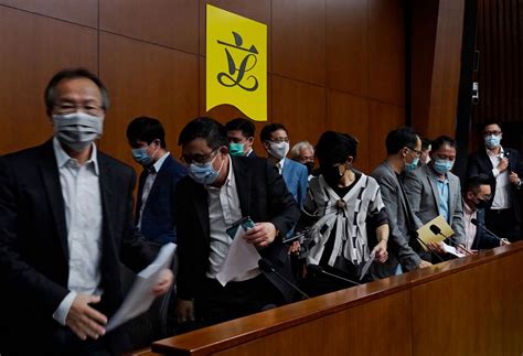 Hong Kongs Pro Democracy Lawmakers Threaten To Resign