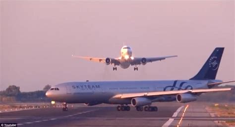 Moment Two Planes Almost Collide On Barcelona Runway Caught On Video