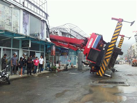 Crane Crashes Onto Phuket Shops