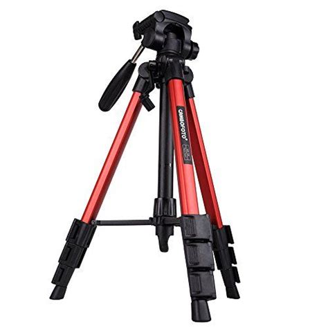 A Tripod With A Camera Attached To It