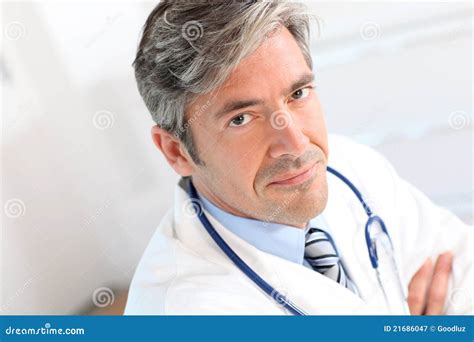 Handsome Guy Doctor In White Lab Coat With Stethoscope On White