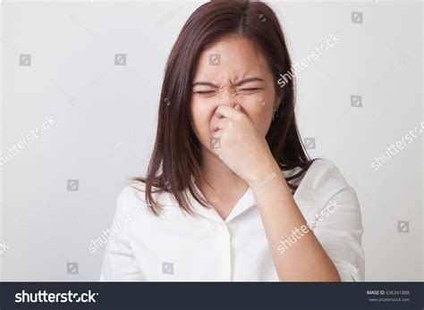3931 Asian Woman Holding Nose Images Stock Photos And Vectors