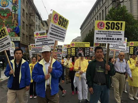 Thousands of Falun Gong members march on SF’s Market Street