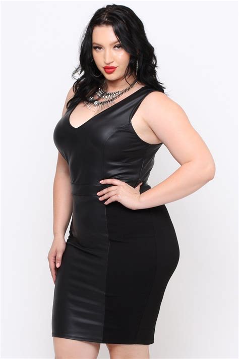 This Plus Size Stretch Knit Dress Features A V Neckline Faux Leather