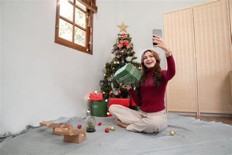 Holiday Selfie At Christmas Tree Happy Young Girl Taking Selfie On