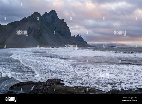 Sunrise Stokksnes cape sea beach and Vestrahorn Mountain with and ocean ...