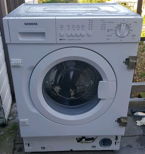 siemens iq700 integrated washing machine, 7kg load, 1200 spin | in ...