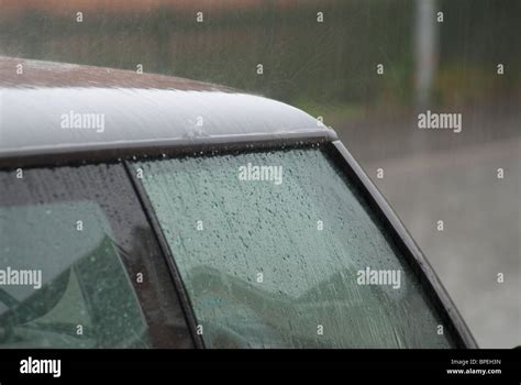 Rain on Car Window Stock Photo - Alamy