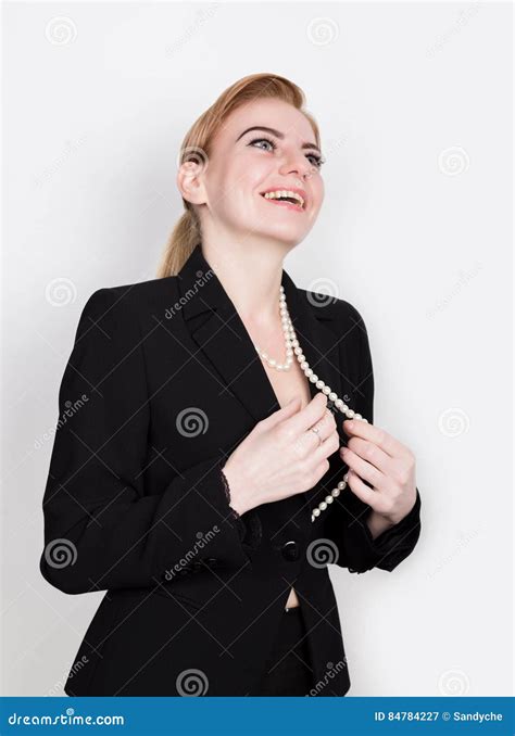 Attractive And Energetic Business Woma In A Suit On Naked Body Smiling