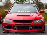 Red Mitsubishi Lancer Evolution Benlevy