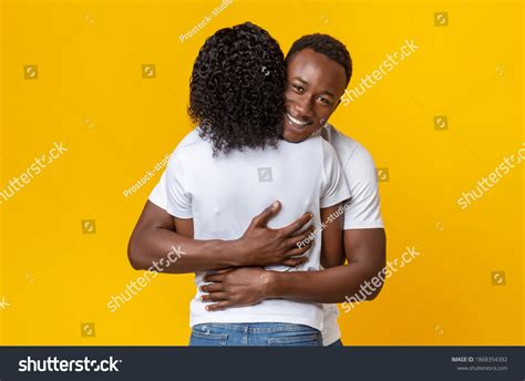 448 Person Hugging His Friend On Black Background Images, Stock Photos ...