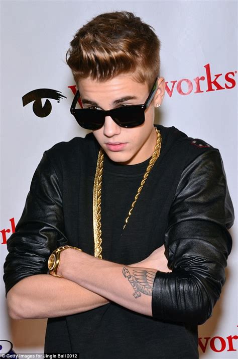 Justin Bieber Dons Heavy Gold Necklace And Super Dark Shades As He