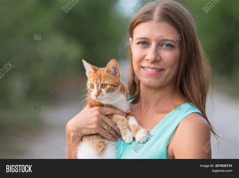 Woman Holding Cat Her Image And Photo Free Trial Bigstock