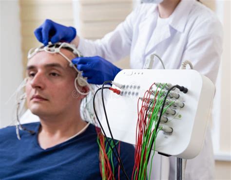 Patient Brain Testing Using Encephalography At Medical Center Stock