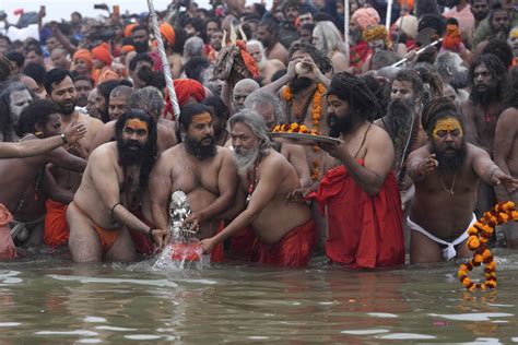 Millions Of Pilgrims And Naked Ash Smeared Ascetics Take Holy Dips In