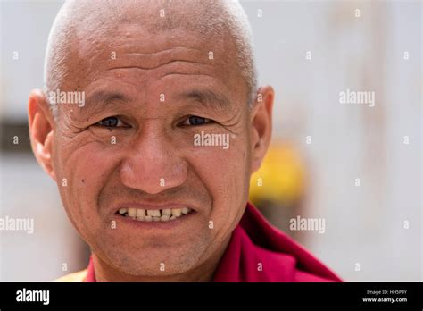 Portrait Of An Old Tibetan Buddhist Monk Stock Photo Alamy