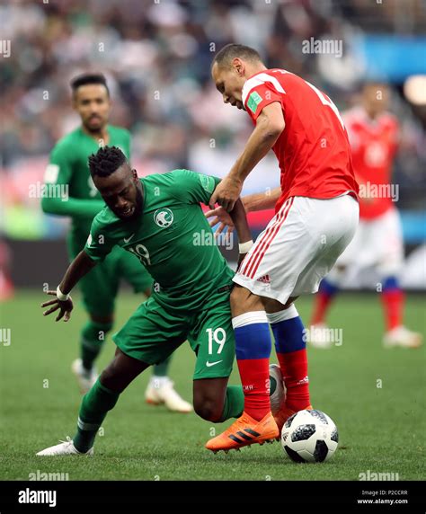 Saudi Arabia S Fahad Al Muwallad Left And Russia S Sergei Ignashevich