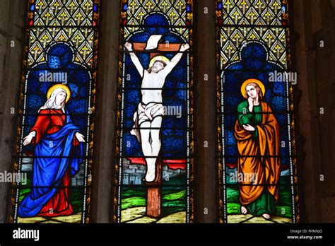 Stained Glass Window Depicting Jesus On The Cross Holy Trinity Church