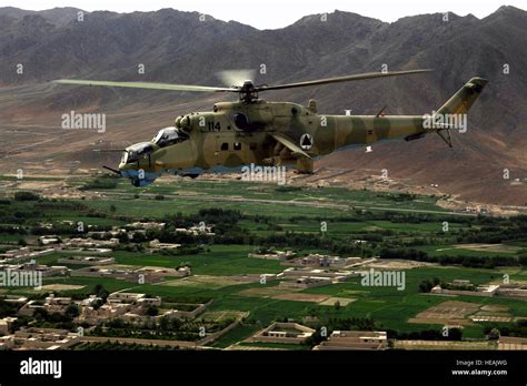 A photo taken from inside an MI-35 Hind E helicopter of another Afghan ...