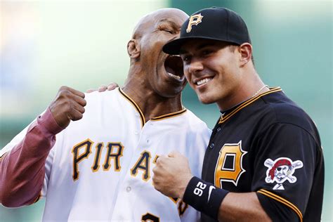 Tyson Throws Out First Pitch Pretends To Bite Players Ear Fox Sports