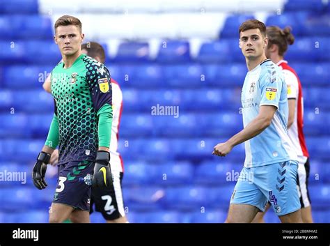 Coventry City Goalkeeper Ben Wilson Left And Michael Rose Walk Onto