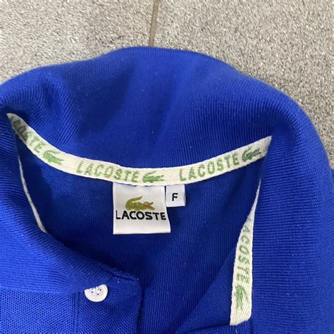 Lacoste polo shirt Fits like a medium In very good... - Depop