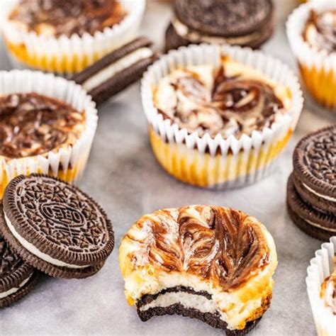 Fudge Swirled Oreo Bottom Cheesecake Cupcakes