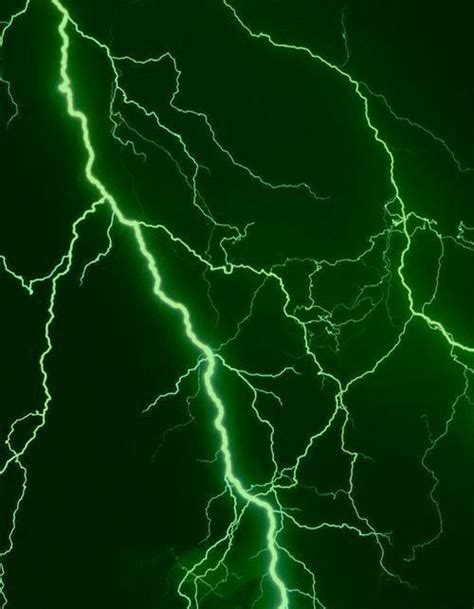 Green And White Lightning Strikes In The Night Sky