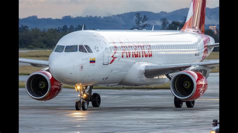 Abordo de Avianca Airbus A320 214 despegando de Bogotá Colombia Take