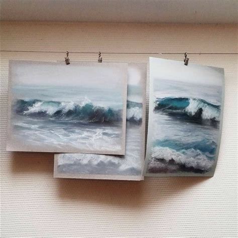 Three Pictures Hanging On A Wall With Water And Waves In The Ocean