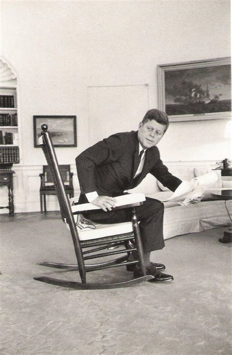 President John F Kennedy Rises From His Favorite Rocking Chair In The