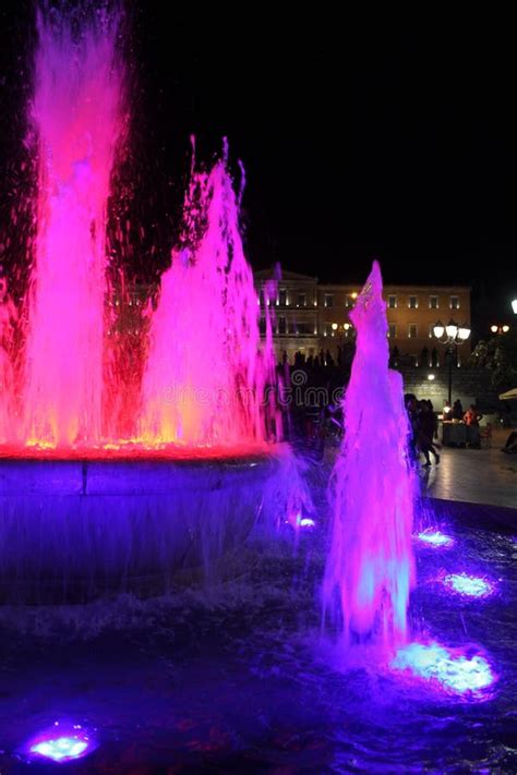 Water Fountain With Colored Water At Night Stock Photo - Image of purple, vivid: 178592322