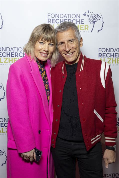 Photo Nagui et sa femme Mélanie Page au photocall du concert du gala