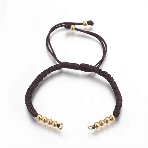 Pulsera conectora ajustable trenzada negra con balines baño oro 24k Ekrea