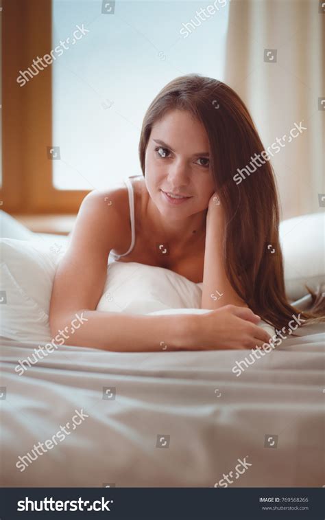 Beautiful Brunette Lying On Bed Home Stock Photo Edit Now