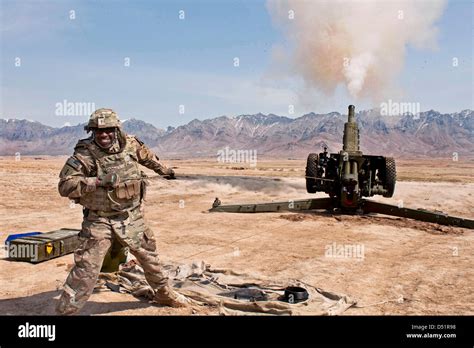 A Us Soldiers Fires A D 30 Howitzer March 19 2013 At Kabul Military