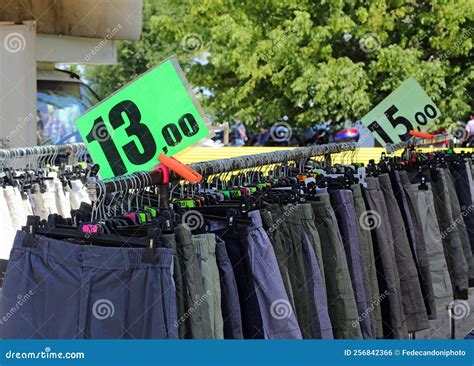 Clothes Stall With The Price Tag For Sale At The Market Stock Photo