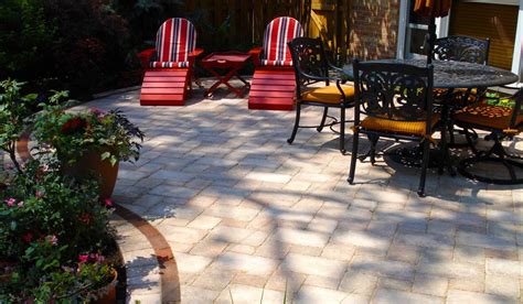 Brussels Block Tumbled Concrete Paver Patio By Unilock With Clay Paver