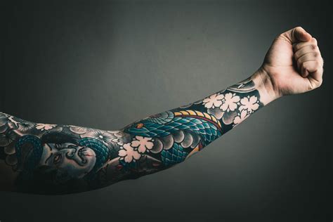 Photo of Left Arm With Tattoo · Free Stock Photo