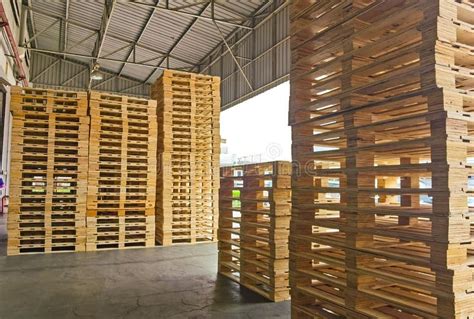 Wooden Pallets Stack At The Freight Cargo Warehouse For Transportation